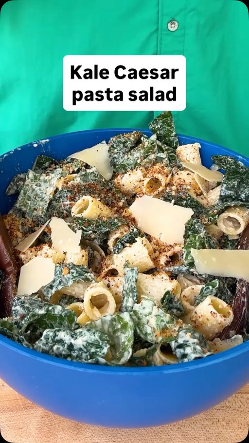 Make @grossypelosi’s Kale Caesar Pasta Salad:

• Salt and black pepper
• 1 pound mezze rigatoni or other short pasta
• 1 cup panko or homemade bread crumbs
• Zest of 2 lemons (reserve lemons for dressing)
• 2 garlic cloves, grated
• 3 tablespoons olive oil
• 4 cups packed baby kale leaves (5 ounces) or 1-inch Tuscan kale ribbons, stems removed
• 1½ ounces Parmesan shavings (about ⅓ cup)
• 1 cup mayonnaise
• 1 cup freshly grated Parmesan
• 1 (2-ounce) can anchovy fillets, drained (about 12)
• 4 large garlic cloves
• Juice of 2 lemons (⅓ cup)
• 4 teaspoons Dijon mustard
• Salt and pepper

Bring a large pot of salted water to a boil. Add pasta and cook until al dente according to package instructions. Drain pasta and spread it out on a tray or sheet pan in a single layer, allowing steam to escape and pasta to cool faster. Set aside.

Place a medium skillet on stovetop over medium heat. Add bread crumbs, lemon zest, garlic, 2 tablespoons oil and a big pinch each of salt and pepper. Stir to mix, then continue to stir until the garlic is fragrant and the bread crumbs are evenly browned, 4 to 5 minutes. Remove from pan and set aside to cool. To store, transfer cooled breadcrumbs to an airtight container and keep at room temperature for up to 2 days.

Make the dressing: In the bowl of a blender or food processor, combine mayonnaise, grated Parmesan, anchovies, garlic, lemon juice, mustard and a pinch each of salt and pepper. Blend on low speed until smooth, about 1 minute. Taste for seasoning, add salt and pepper as needed. If not using immediately, transfer to an airtight container and refrigerate for up to 5 days.

In a large bowl, use your hands to massage kale with remaining 1 tablespoon olive oil until just tender. Add cooled pasta and 1½ cups of the dressing and toss until well mixed. Cover and refrigerate for at least 4 hours or up to overnight.

Before serving, add Parmesan shavings, half of the breadcrumbs and extra dressing as needed, and stir until just combined. Garnish with the rest of the breadcrumbs and serve immediately. Leftovers will last for 5 days in the refrigerator.
