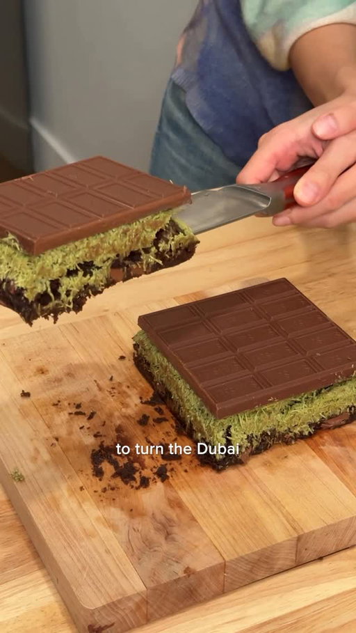 #ad I decided that just a dubai chocolate bar wouldn’t cut it, so why not add a brownie to the bottom. I used the HERSHEY’s brownie recipe and a dubai chocolate flair to the top.

Ingredients:
Brownie Base
¾ cup unsalted butter (170 g)
1 ½ cups granulated sugar (300 g)
1 ½ teaspoons vanilla extract (7.5 g)
3 large eggs (150 g, shelled)
⅔ cup unsweetened cocoa powder (56 g)
¾ cup all-purpose flour (90 g)
⅜ teaspoon baking powder (1.5 g)
¼ teaspoon salt, scant (0.75 g)
1 HERSHEY’S Symphony Bar, chopped (150 g)

Truffle Layer
1 cup chocolate chips or chopped chocolate (170 g)
⅓ cup heavy cream (80 g)
1 cup kataifi (60–70 g), shredded filo
2 tablespoons unsalted butter (28 g)
⅓ cup pistachio cream (80–100 g)
⅛ teaspoon cardamom (0.25 g)
⅛ teaspoon salt (0.25 g)
1 HERSHEY’s Symphony Bar, for topping

Recipe continued in the comments!