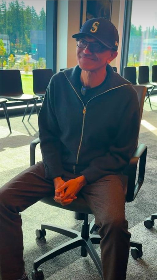 The CEO of Microsoft and Humpy the Salmon. Peak Seattle energy.