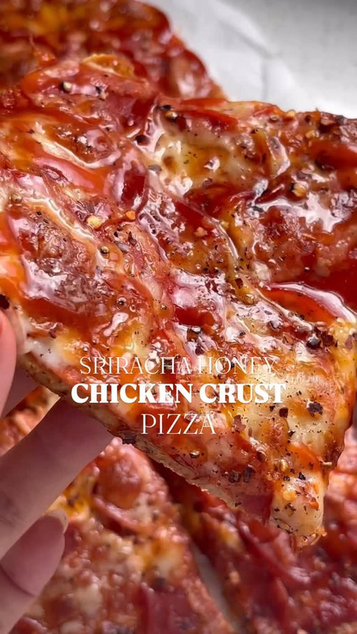 Sriracha Honey Chicken Crust Pizza 🍕 

This recipe broke the internet and my taste buds 🔥

High protein, low carb, bigggggg flavor energy!! Save it, try it, thank me later!

Comment “recipe” and I’ll send the full printable recipe, macros, tips and tricks straight to your DMs! (Just need to add the sriracha and honey on top on this recipe) https://basicswithbails.com/ingredients/chicken/chicken-crust-pizza/

INGREDIENTS -
CHICKEN CRUST
450g ground chicken
2 large eggs
1/2 cup parmesan cheese
1 tsp garlic powder
1 tsp italian seasoning
1/2 tsp salt
1/2 tsp black pepper

TOPPINGS
1/2 cup pizza sauce
1 cup mozarella cheese
20-30 turkey pepperoni slices
Sriracha drizzle
Honey drizzle

DIRECTIONS -
1) Set your oven to 400°F (200°C) and line a baking sheet with parchment paper.
2) In a large bowl, mix together ground chicken, eggs, parmesan, garlic powder, Italian seasoning, salt, and black pepper until fully combined.
3) Transfer the chicken mixture onto the prepared baking sheet and press it into a thin, even circle or rectangle. 
4) Pop it in the oven for 25 minutes, or until golden and firm. Let it rest for 5 minutes to set.
5) Crank the oven up to 450°F. Spread on your favorite pizza sauce, cheese, and toppings.
6) Bake for another 10 minutes, until the cheese is melty and bubbly.
7) Let it cool slightly, then drizzle on sriracha and honey. Dig in and enjoy every crispy, cheesy bite!

#highproteindinner #easydinnerrecipes #chickencrustpizza #chickencrust #proteinpizza #easydinnerideas