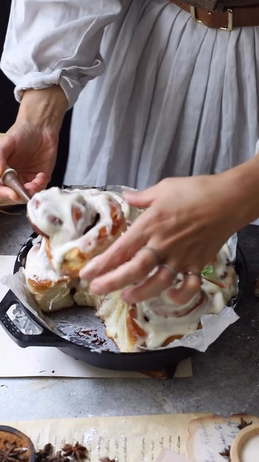 The Best Cinnamon Rolls with A Touch of Pumpkin😋

Ingredients:
For the Dough:
2 tsp/ 6g instant dry yeast 
1/2 cup/110ml warm milk
4 tbsp /58g sugar 
2 3/4 cups/357g flour
Pinch of salt/2g
2 eggs
1 tsp/4g vanilla
4 tbsp/56g butter

For the Filling:
5 tbsp butter
1/4 cup brown sugar
1 1/2 tbsp cinnamon
Pinch of salt
1/2 tsp vanilla extract
Caramelized Pumpkin Puree (see below)

For the Frosting:
4 oz cream cheese (typically half a package)
3 tbsp butter
1 tbsp milk
1 cup powdered sugar
1/2 tsp vanilla extract
Pinch of salt
1/4 cup pistachios, chopped (optional)

Instructions:
Prepare the Dough: In a large bowl, whisk together the warm milk, yeast, and 1/2 tsp sugar and let it rest until fluffy for 5-7 min.

In a large bowl (preferably of a stand mixer), add the flour, the remaining sugar, salt, eggs, butter, vanilla, and the activated yeast. Mix them well until combined for about 3-4 minutes. Then, cover it with a cloth or plastic wrap and let it rest at room temperature for 4-5 minutes.

After the dough has rested, knead the dough with a stand mixer or using your hands for 8-10 mins. Then transfer the dough into a large bowl and cover it with plastic wrap and let it sit for 40-45 minutes until doubled in size. After the initial proof, place it in the refrigerator and let it rest for another 1 1/2 hours.

Prepare the Filling: In a medium bowl, mix the butter, sugar, cinnamon, salt, and vanilla. 

Place the dough onto a lightly floured surface and roll the dough into a rectangle (around 1/4 inch thick).Evenly spread the cinnamon mixture over the dough. If you’re adding Caramelized Pumpkin Puree, spread the puree over top the cinnamon filling. Starting from the long end, roll the dough down to the bottom edge until you have one long roll. Using a string or sharp knife, cut the dough into 8-9 equal rolls. 

Place the buns on prepared baking sheets or a cast iron skillet lined with parchment paper and cover it with a clean kitchen towel. Let it rest for 40-45 min at room temp.
📌the rest is in the pinned comment
