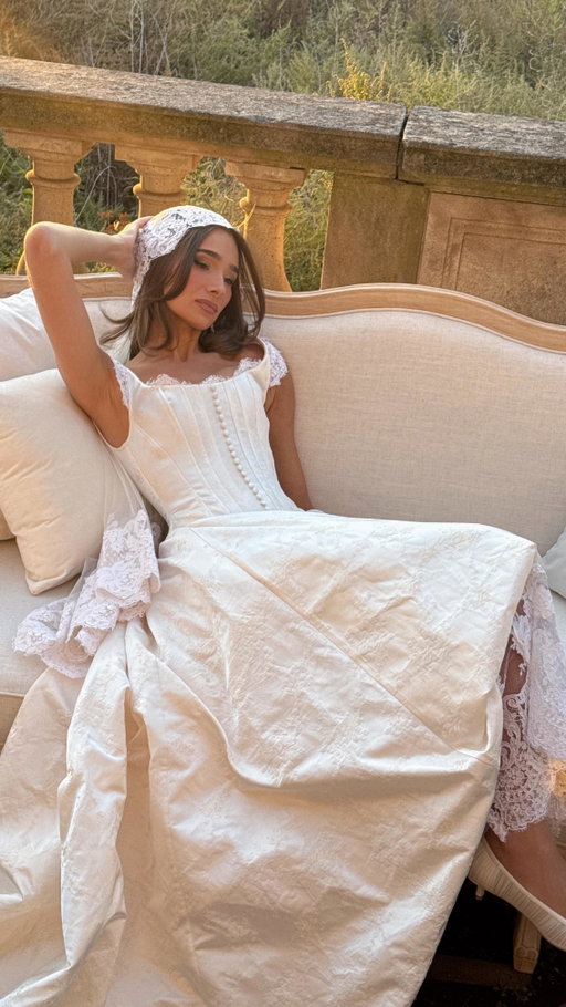THE DRESS 🤍 A @kimkassascouture custom dress stitched with history ~ vintage French lace, tea–dyed by hand to give it life and warmth, a structured silk brocade corset that echoes the past, and an asymmetrical modern balloon skirt. Romantic and special, tailored just for me! 

Paired with custom @jimmychoo shoes and @lorraineschwartz jewelry 🤍