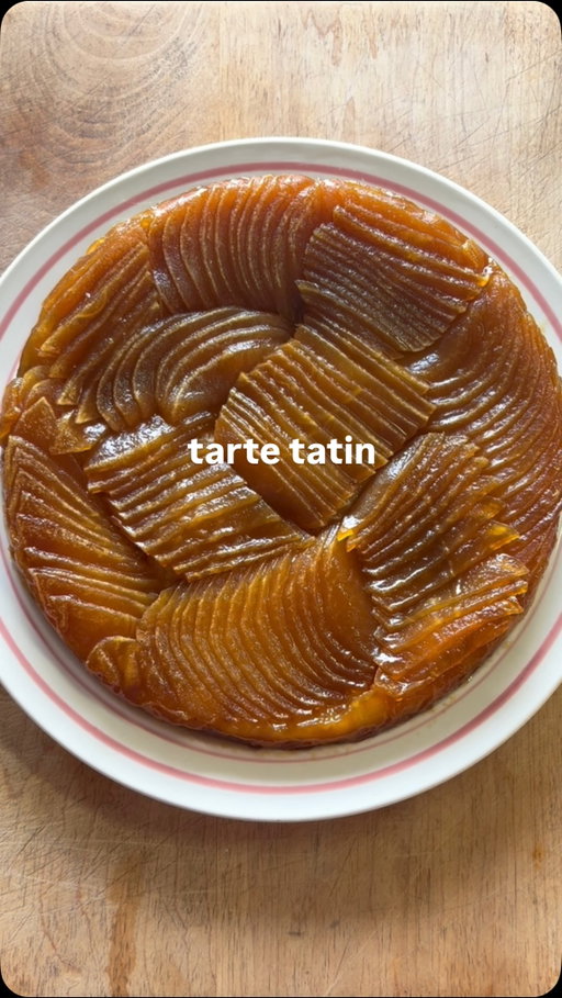 How to Make an Apple Tarte Tatin 🍎🍎🍎

NOTE: this is for a 9" cast iron skillet - measurements for a bigger/smaller pan will need to be scaled accordingly

INGREDIENTS:
4 large honeycrisp apples
1 large sheet frozen puff pastry (thawed)
2/3 cup granulated sugar
1 tbsp apple cider vinegar 
1 tbsp water
3 tbsp cold unsalted butter
250 mL 35% whipping cream
1 tbsp icing sugar
1 tsp cinnamon
1 tsp vanilla extract 

INSTRUCTIONS:
1. Peel your apples, and cut each apple into 3 equal segments, removing the stem and core. Place your peeled apple segments in a large container or bowl, and submerge them with hot water from your tap. (Tap water at its hottest setting, is typically between 50-60 degrees Celsius, which is what we’re aiming for - if not, adjust the temperature as needed!). Let your apples sit in the water for at least 10 minutes, or until we are done the next step.
2. While your apples are soaking, make your caramel! Using a 9" round cast-iron pan (you can also use another pot/pan to make your caramel, then transfer it to a 9" round baking dish after). Cover the bottom of your pan with an even layer of your granulated sugar, then drizzle your 1 tbsp vinegar and 1 tbsp water to cover the sugar (add more water if needed to cover the sugar). Turn your stove top to medium heat, and allow the sugar to come to a boil, before reducing into a caramel. What you are looking for with your caramel, is for a light brown colour to appear. Once you see this (likely just in one section of your pan, VERY CAREFULLY tilt your pan in a circular motion to make sure the sugar caramelizes evenly - but DO NOT stir or whisk your caramel at any point, or else it will crystallize. Once your sugar is evenly caramelized everywhere (now a thick, syrupy consistency), stop the caramelization by stirring in your cold butter. At this point it is okay to stir, and you will continue stirring for 2-3 minutes, or until the caramel is thick and emulsified (see video for a visual). Remove your caramel from the heat.

RECIPE CONTINUES IN THE COMMENTS ⬇️

#apple #tartetatin #homecooking #recipe