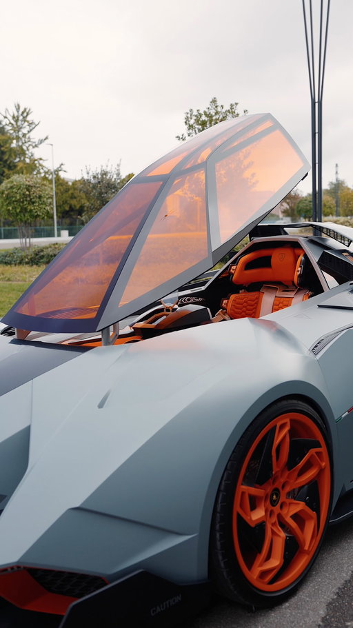 A car coming from fighter-jet inspired design, made not to be shared. This is Lamborghini Egoista, the one-of-one super sports car born to celebrate our 50th anniversary. With a 5.2-liter V10 that produces 600 hp, brings a futuristic vision to life. To exit the car, the driver must first remove the steering wheel—just like a jet pilot.