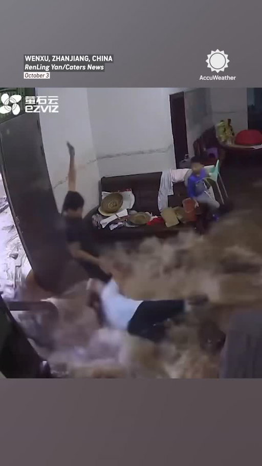 Watch the moment floodwaters burst into a home in China, as Typhoon Matmo made landfall earlier this month with 100 mph winds and heavy flooding rain.