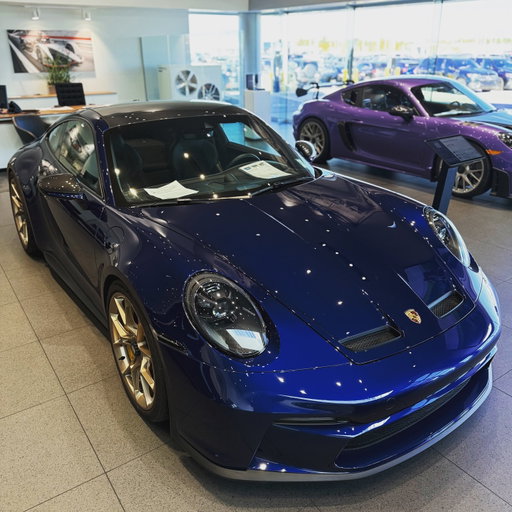 Pure precision. 💙 The 2023 Porsche 911 GT3 Touring in Gentian Blue — 502 hp, 6-speed manual, and carbon-fiber elegance. Just 2,611 miles of perfection. Yours for $297,991. #Porsche911 #GT3Touring