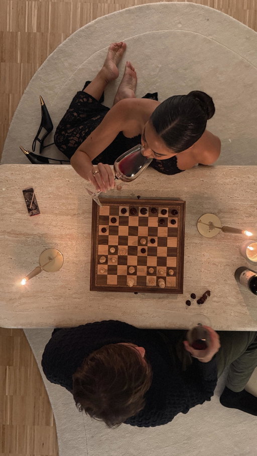 He’s teaching me chess…I’m teaching him patience 🖤♟️ #datenight #couple