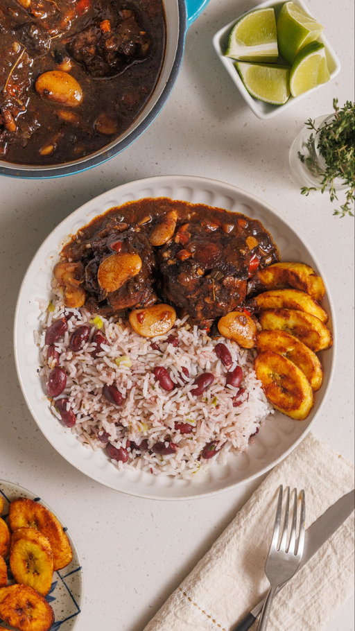 This oxtail stew = comfort in a bowl 😋🍲 @matthewchincreative 

RECIPE 👇

Ingredient list:

2-4 lbs oxtail fresh (6-8 pieces) 
2 cups vinegar (optional)
1 lime, halved
2 tbsp browning sauce
¼ cup brown sugar 
2 tsp browning sauce
2 garlic cloves, minced
1 tbsp ginger, minced
3 tbsp thyme, stems removed
¼ green onions, sliced
1 tbsp garlic powder
1 tbsp paprika
1 tbsp cajun seasoning
2 tbsp allspice
1 tbsp all purpose seasoning
¼ cup carrots, finely diced (optional)
1 bell pepper, cut into strips
½ cup yellow onion, diced
2 tbsp olive oil
2 cups beef stock
1 scotch bonnet pepper
2 tbsp ketchup
2 tbsp soy sauce
2 bay leaves
1 cup butter beans 

Instructions:

In a large bowl place your oxtail and clean it with vinegar and lime. Drain vinegar and rinse. 
Add browning sauce, brown sugar, garlic, ginger, thyme, green onions, spices, carrots, bell peppers and onions to a bowl. Mix thoroughly and let marinate for 2-4 hours in the fridge. 
Heat a large dutch oven pot on medium high. 
Add olive oil followed by oxtail pieces and braise until dark brown on each side. 
Add veggies into the pot and mix until well combined. 
Pour beef stock, ketchup, soy sauce, scotch bonnet pepper and bay leaves into the pot. Stir, then let simmer for 2-4 hours until completely tender. 
When it’s about 30 minutes until ready, pour butter beans and simmer until fully cooked. 
Once ready, let rest for 30 minutes before serving with rice and peas and plantain (optional).