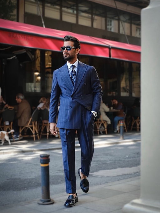 Classic look, modern approach. @melikkamstore ‘s Navy  Pinstripe Trophy Suit never fails.