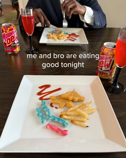 Munching on Trolli x Mountain Dew gummi worms, sipping Dew from the finest glassware…