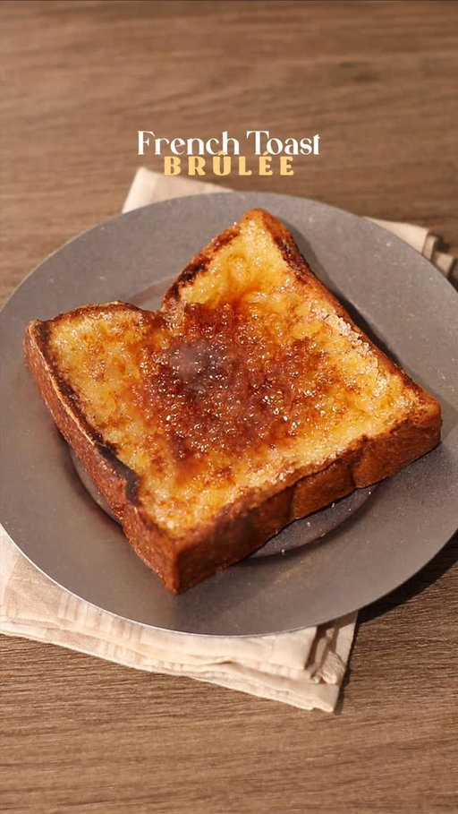 🍞🍮 French Toast Brûlée

📝 Recipe

1 Egg
30ml • Milk
½ tsp • Cinnamon Ground
½ • Vanilla Beans (optional)
1 Slice • Thick Bread
1 tbsp • Butter
1 tbsp • Caster Sugar

🏷️ equipment needed: blow torch 

Instructions:

• Egg Mixture
- crack open 1 egg in a bowl / plate
- pour milk
- add cinnamon ground and vanilla beans
- whisk the egg mixture until it’s mixed well

• Cooking; Bread 
- heat the pan and melt butter in medium heat
- dip / coat the bread all over with the egg mixture 
- fry the bread on the pan, flip, add another butter
- cook until both sides are golden brown

• Finishing; Caramelized French Toast Brûlée
- add sugar on top of the french toast and blow torch the sugar until caramelized

//

Brûlée your French Toast from now on! Cuz it’s delicious 😋

—

#frenchtoast #creambrulee #homecafe #홈카페 #asmr #homecooking #breadrecipe #caramelized #easyrecipes #easyrecipesathome