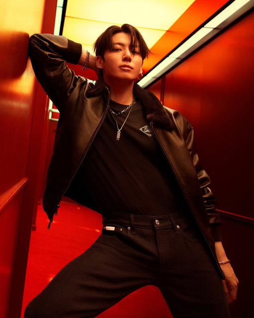 @mnijungkook slips into leather.

Warm up for the night in the cotton tee and tapered jean. The shearling-trimmed leather jacket makes the look. 

Photographed by @mertalas.
Discover the campaign on CalvinKlein.com