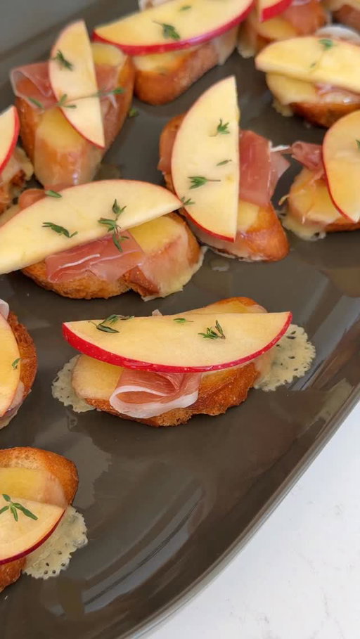 Easy app alert! 🍎🥖 Save this apple and white cheddar crostini recipe for when you need a quick snack at your next get-together. We sliced up in-season apples, white cheddar and a crusty baguette with the @wusthof Gourmet 10-piece knife block set for a crowd-pleasing app in minutes. Be sure to add this triple-riveted, full-tang knife block set to your wedding registry for effortless entertaining and daily meal prep. 

Recipe 👇🏼

1 baguette
¼ cup extra-virgin olive oil
Kosher salt
Freshly ground black pepper
6 oz. sharp white cheddar cheese, thinly sliced
4 oz. thinly sliced prosciutto
1 small apple, cored and thinly sliced
2 tbsp. honey
2 tbsp. fresh thyme leaves

1. Preheat the oven to 375°F.

2. Cut 24 ⅓-inch thick slices from the baguette, and lay them on a baking sheet. Brush the tops with the olive oil and lightly season with salt and pepper.

3. Bake on the middle rack in the oven for 10 minutes. Remove the pan from the oven, and top each crostini with a piece of cheese. Return the pan to the oven and bake until the cheese is melty, about 2 minutes.

4. Place the crostini on a serving platter. Drape a small piece of prosciutto onto each crostini, and top each with an apple slice. Drizzle the crostini with honey and garnish with thyme leaves.

#FallAppetizer #AppleCrostini