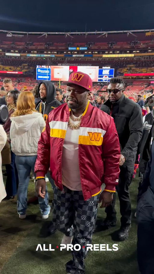 50 Cent greets Washington Commanders fans and Washington Redskins Legend Doug Williams pregame at Sunday Night Football