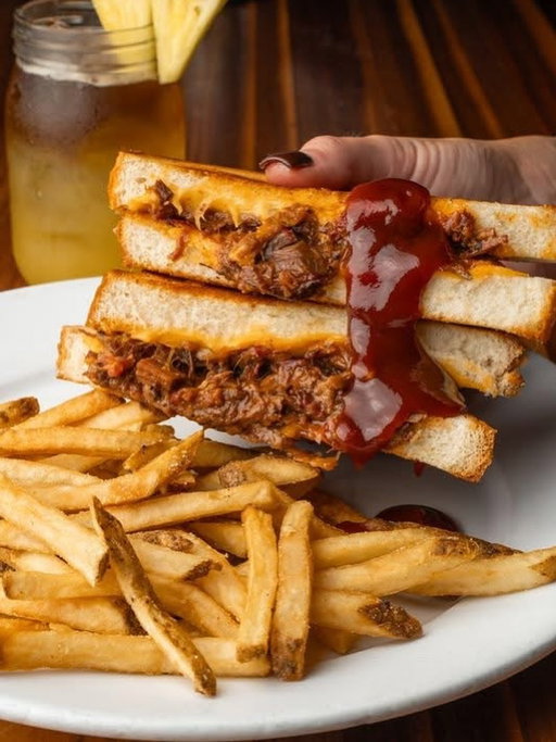🥪 Celebrate National Sandwich Day the right way...
with our Brisket Stuffed Grilled Cheese —
housemade chopped brisket, melty cheddar jack & American,
all packed between thick-sliced grilled bread. Served with your favorite side.
