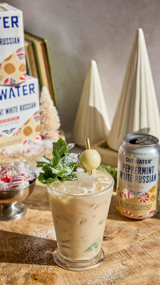 White Russian or Mint Julep? #ad 

Now you can have them both in one glass! The Peppermint Julep is your cue to embrace something extra, especially when it involves @cutwaterspirits Peppermint White Russian. 

To a tall glass or julep glass add in: 
3 dashes chocolate bitters 
5-6 mint leaves 
Gently muddle, press, twist, lift, repeat. 
Then add in crushed ice 
Pour in your Cutwater Peppermint white Russian 
Give a mix, top with crushed ice and garnish. 
Garnish: Fresh mint, powdered sugar snow dusting moment, and a @Lindt_usa white truffle chocolate… yum? 

Whether you’re sipipng a perfectly mixed can or making it extra special, make sure to enjoy responsibly this holiday season and in good company! 

Xx, cheers