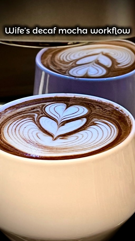 Best mocha! ☕️🍫 (according to the mocha expert of my wife 😉)

After so many mochas posted on stories almost every morning, I am pleased to share the recipie and workflow!

My wife always orders mocha (hot or iced) whenever we go to a coffee shop, and I can tell you she will most likely say it tastes weak, not tasty enough, or not like pure chocolate. She surely has a dark-chocolate-forwards well trained palate. And not only coming from her but guests at home have also let me know they haven’t tasted such mocha out there! Therefore, after mastering the recipie she loves, I’d love you to try and let me know! 🧑🏻‍🍳

Why decaf? You might ask. Since she got pregnant last year, we tried decaf specialty coffee at home and, I can surely affirm, it is tastier than some regular ones! Here, I am using the Sidama Decaf from @buunnicoffee, a Swiss water, single origin Ethiopia, medium roast, which with those cane sugar and balanced berry acidity notes matches perfectly with anything, and it’s delicious in espresso! 😋

👉🏼 Get $50-off La Seine X (link in bio)
👉🏼 Get your Kruve porcelain cup (link in bio) and you will be supporting my account 🫶🏼

📝Decaf mocha recipie:
• 6-7g raw honey (rosemary one, my mom’s favorite from our beekeeper friend in Spain @gimiele_mielartesanal).
• 20g 85% dark chocolate (this one is from a grocery store in Spain @mercadona, that my wife particularly loves).
• Double shot of espresso (use light roast for enhanced fruitiness, darker roast for bold character, or medium roast for a balance of both).
• 6 fl oz steamed milk (I use 4 fl oz of 2% cow milk, and 2 fl oz of almond milk).

Coffee tools:
• Espresso machine (grinding, pressure profiling and steaming): La Seine X from @maxims_coffee
• Latte art pitcher (450 ml sharp spout) and distributor (gravity) from @normcorewares
• Tamper (V6 impact) from @ikape_espresso @ikape_products
• Double wall pink porcelain cup (250 ml) from @kruveinc 

#coffee #cafe #specialtycoffee #barista #mocha #coffelover #latteart #latteartgram #fall #coffeetime #maximsespresso #seinex #fallvibes #autumn #autumnvibes #instacoffee #reelinstagram #fyp
