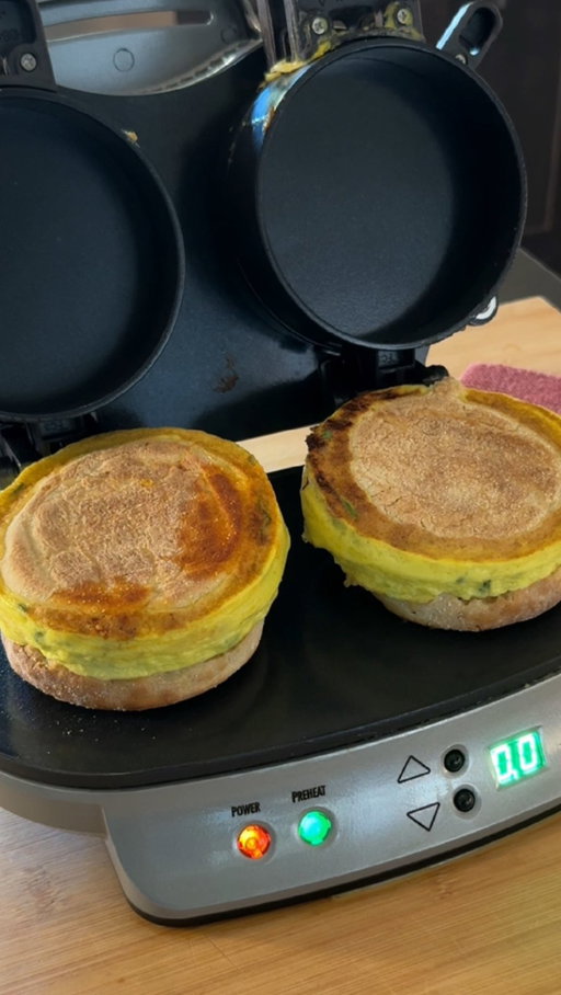 Perfect for the holidays. Shop the @hamiltonbeach Dual Breakfast Sandwich Maker — link in bio. Also here: http://hamiltonbeach.sjv.io/3J4Qnv

His & Hers Breakfast Sandwiches
Ingredients:
His:
	•	English muffin
	•	1 egg
	•	1 tsp Asian chili crunch
	•	spicy sausage patty
	•	1 slice cheese

Mine:
	•	English muffin
	•	egg
	•	Small handful spinach
	•	Canadian bacon
	•	1 slice cheese
	•	Drizzle of honey

Instructions:
	1.	Preheat the Hamilton Beach Dual Breakfast Sandwich Maker.
	2.	For his sandwich, layer the bottom half of the muffin, cheese, patty, chili crunch, and crack the egg on the top plate.
	3.	For mine, layer muffin, turkey, spinach, cheese, and pour egg on the top plate.
	4.	Close the lid and cook both for about 5 minutes until the timer beeps.
	5.	Lift the lid — reveal two perfectly cooked, hot sandwiches ready at the same time.
	6.	Plate, drizzle honey on yours (if you’re a sweet breakfast lover), and enjoy together.

#sponsored #hamiltonbeach #dualbreakfastsandwichmaker #easybreakfast #cozykitchen #comfortfood