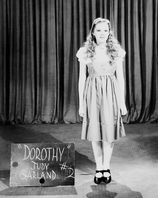 Various photos taken during the production of THE WIZARD OF OZ (‘39).

Costume test for Judy Garland
Margaret Hamilton at the Wicked Witch of the West. Note her hair is different than in final film.
Ray Bolger in a costume test as the Scarecrow
Pat Walshe as Niko the Winged Monkey, in profile
Film Editor Blanche Sewell, looking at reels of film
Billie Burke as Glinda, the Good Witch

See the film tonight at 8pm ET as we kick off our spotlight, Objects of Desire