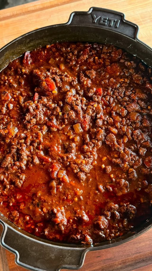 Texas chili is our most popular chili recipe! Let’s make it⬇️

4 lbs of ground meat (venison is also great and is Matt’s fav)
1 lb of HOT breakfast sausage
3 medium red onions, diced
1 head of garlic, minced
84 ounces of tomatoes and sauce total. Use the below or interchange to your liking as long as you use at least 84 ounces)
2, 28oz can crushed tomatoes with juice
1, 28oz fire roasted diced tomatoes with juice
1 7oz can Chipotles in Adobo Sauce, diced. Preserve the liquid.
2 beers. 1 for the chili and 1 to drink while you’re making it. (sub beef broth)
5 T Meat Church Texas Chili Seasoning (https://www.meatchurch.com/products/texas-chili-seasoning).
1/3c olive oil
Garnish
Shredded cheese
Diced white onions
-Add the olive oil to a very large skillet. I prefer cast iron. Sauté the onions, garlic and adobo peppers (including all the liquid from the can). This is a lot of onion, so you may have to cook in 2 batches if you don’t have a really large skillet.
Cook for about 10 minutes until the onions are translucent. Remove from skillet and place the mixture in your slow cooker or dutch oven.
-Cook the ground meat and breakfast sausage completely in the same skillet. Drain the fat and place all of the meat in the slow cooker or dutch oven.
-By this time you already have the meat, onions, garlic and adobo peppers in your slow cooker or dutch oven. Now add the tomatoes with the juice, 1 beer and 5 T of Meat Church Texas Chili Seasoning.
-This chili can cook in 3 hours. However, it is better if you can cook it for 6 - 8 hours. The ingredients are already cooked at this point, but we will simmer this chili all day to break down the meat and meld the flavors together.
If you are using a slow cooker:
Cook the chili on low for 6 - 8 stirring periodically.
-If you are you are using a smoker:
Cook the chili at 225 for for 4-5 hours uncovered stirring periodically. Cover and continue to cook for 2-3 more hours. 
-Remove from the heat. Allow it to cool. Garnish and enjoy!

#meatchurch #texasbbq #bbq #texaschili