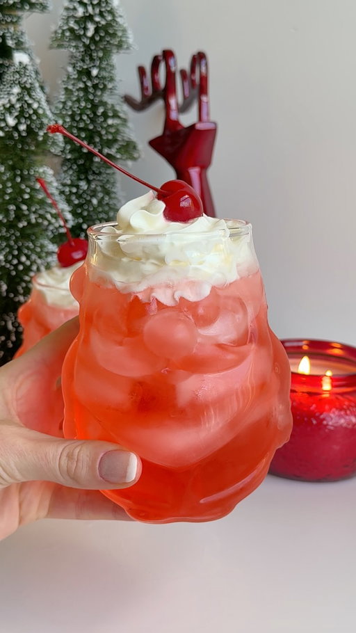 Dirty Shirley but make it festive. ✨🎅 Link for the Santa glasses are in our bio.

@cocktails & @purewow may earn commission through links in our socials.

Ingredients:
- 2 oz. vodka
- 1 oz. grenadine
- 7.5 oz. can of Sprite
- top with whipped cream and a cherry

#christmas #holiday #dirtyshirly #dirtysanta #cocktail