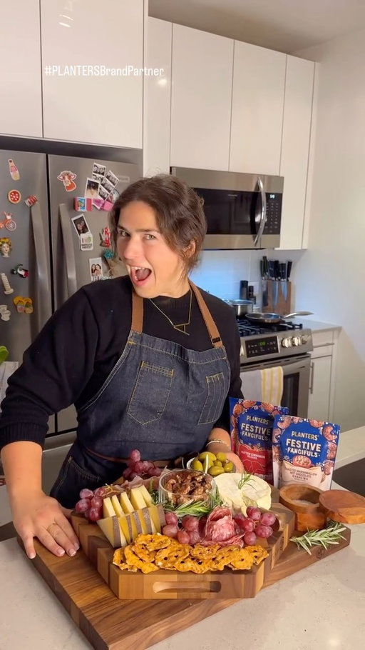 #PLANTERSBrandPartner Hosting during the holidays can be stressful, but it doesn’t have to be with @mrpeanutofficial. One of my favorite hacks is having a snack board ready for guests to nibble on the second they walk in. It buys you time to finish getting dinner together and makes everyone instantly happy.

Here’s how I build mine ⤵️

🧀 Cheese: Start with 1–2 cheeses — one hard and one soft. Think Parmigiano, Manchego, or Cheddar for structure, and then something creamy like Brie or goat cheese for contrast.
🥓 Meats: Add some cured meats like prosciutto, sopressata, or salami. Fold or roll them to create dimension and make the board look full.
🥜 Nuts: My favorite part — the PLANTERS® FESTIVE FANCIFULS™ Nuts They bring flavor and crunch, and bonus points for going seasonal. I am loving the Butter Cinnamon Pecans, which are kettle-cooked and coated in buttery cinnamon goodness.
🥨 Crackers & Crunch: To balance the sweet, add a salty cracker or pretzels. Play with shapes and textures — I love something thin and crisp, that can double as a vessel for spreading.
🍇 Fresh Fruit & Olives: Brighten up the board with pops of color and acidity — grapes, citrus slices, or marinated olives.
🍯 Sweet Touch: Finish strong with jam or honey to give people the chance to build their own perfect sweet-salty bite.
🌿 Garnish: A few sprigs of rosemary or thyme will help it feel extra festive.

It’s the perfect mix of salty, sweet, soft, and crunchy and the easiest way to impress your guests….Now for some practical research…💬 

What’s your must-have element on a snacking board?

#SnackBoard #HolidayHosting #CheeseboardInspo #EntertainingTips #PLANTERSNuts