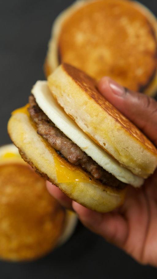 Quick & Freezer-Friendly Breakfast Pancake Sandwiches 

Who needs a drive-thru when breakfast like this takes 5 minutes at home all thanks to the Hamilton Beach Single Breakfast sandwich maker!! 🥞🍳 @hamiltonbeach #sponsored 
——————-
Ingredients - 
4 Large Eggs 
4 Slices Cheddar Cheese 
4 Precooked Sausage Patties 
Chives (Optional)
——————-
Yield - 8 Pancakes (4 Pancake Sandwiches)

Hungry Jack | Extra Light & Fluffy - 
2 1/4 Cups Pancake Mix 
1 1/2 Cup water
Maple Syrup (Optional) 
————-
Tools Needed - 
Vegetable Oil Spray 
Parchment Paper 
3.5” Cookie Cutter 
———————————
https://www.thatsavagekitchen.recipes/recipes/quick-homemade-mcgriddles-(hamilton-beach-maker)
————————
#thatsavagekitchen #breakfast #eggs #pancake #food #foodie