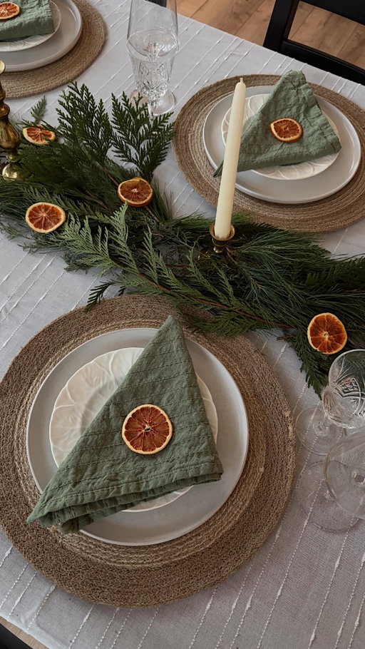 Setting up my first little table setting for a friends-giving dinner that we hosted at our house 🥺❤️ 

Had to pick up a lot of new items now that we have more space to host friends, so I tried to pick neutral colours for the napkins, table cloth and chargers that can be reused in the future in other seasons, but added a festive touch with pine & cedar branches and dried orange slices layered on top. 

@homesensecanada tablecloth, napkins and chargers 
@crateandbarrelcanada dinner plates
@valuevillage_thrift thrifted crystal glasses, brass candle holders and vintage Wedgwood salad plates 
@westelmcanada wine glasses 

#pinteresthome #tablescapestyling #torontoblogger #homedecorinspo #thanksgivingtable #christmastablesetting #pinterestinspo #dinnerpartyideas #christmasdecorideas