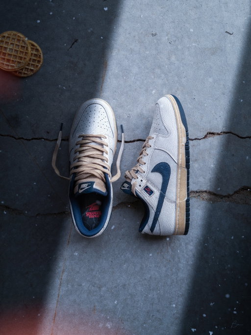Swipe for a tutorial on this one 🫡 
 
This one may end up going down as one of my favourite photos of 2025. 
 
Not only am I arguably one of the biggest Stranger Things fans out there… (no seriously, I’ll battle for that spot), I’m also a huge sneaker head. So when @nike and @strangerthingstv announced these new Dunks, I literally had no choice but to snag them. 
 
Now of course, they sold out right away… but luckily @stockx had my size 🫡 
 
This shot was obviously inspired by The Upside Down, so we had to hit it with those cool, blue tones, and get the iconic waffles from El in there. Little bit of masking to add some drama, cracked up the concrete floor, and of course add in the Upside Down spores & particles floating around the scene. 
 
Swipe to the 3rd frame to see how I did it! 
 
Anyways, who’s stoked for November 26th?!