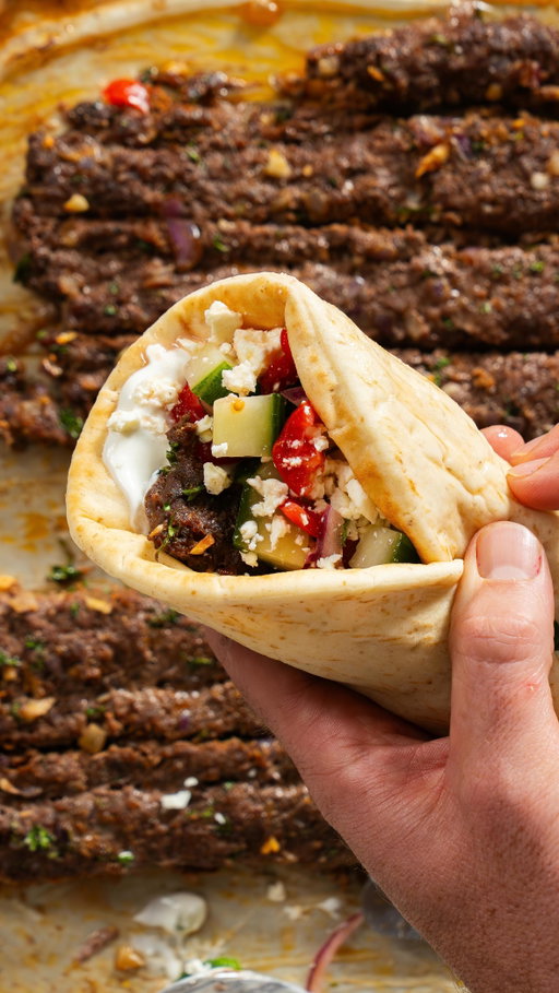 Save this recipe to your meal plan collection for an easy week night dinner option!
•
Want to make Beef Kebabs yourself? All you need is: 
Ingredients: 
2 lbs lean ground beef
3 cloves garlic, minced
1/2 small red onion, diced
1 cup chopped parsley
1 tbsp cumin
1 tbsp coriander
1 tbsp smoked paprika
1 tsp cinnamon
1 tsp garlic powder
2 tsp salt
Pepper to taste
TO SERVE
Store-bought tzatziki
Chopped cucumber
Red onions (soaked in lemon juice)
Feta
Chopped fresh mint
Greek style pita bread
•
Bold, simple, and built to serve a crew! Save this one for later folks! Comment “Recipe” to have the full recipe sent to you!