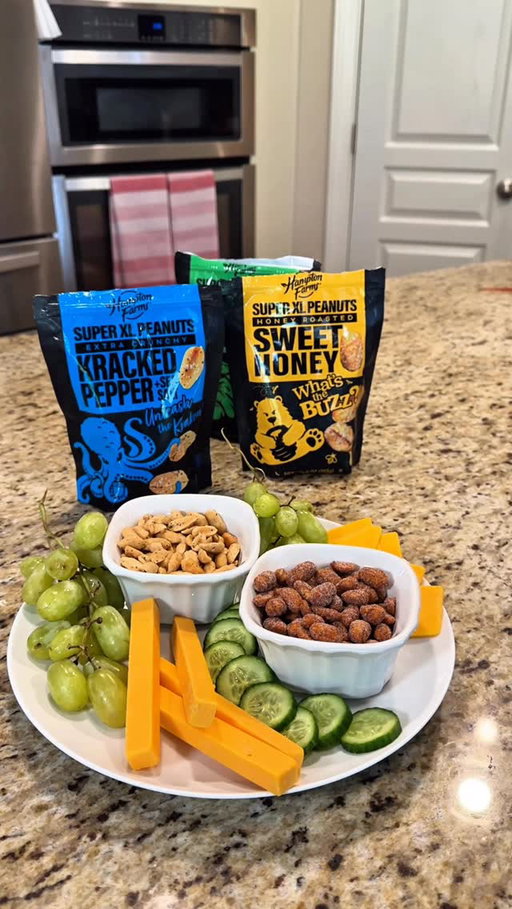 #AD Building the easiest snack plate with my favorite @HamptonFarmsPeanuts Super Extra-Large Peanuts 🥜 Perfect for any charcuterie board moment or to enjoy on your own. Each bag is packed with bold flavor, the best crunch, and 7–8g of protein per serving. With flavors like Salted, Kracked Pepper, and Sweet Honey, they are so good that I can’t even pick a favorite. Be sure to check them out at your local @Publix.

#hamptonfarmspeanuts #getnutty #publixfinds #snackplates #charcuterieboards #snacktime #highprotein #foodie #quicksnacks #charcuterie #kidsnacks #holidaysnacks