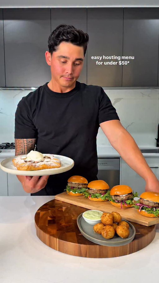 Quick, no stress food for those last minute catch ups this festive season. Here’s a simple lineup you can stock up on from @colessupermarkets to pull together a seriously good feed for four all under $50*. #Ad

*Total cost of the recipe is approximate based on the ingredient portions used in the recipe. Ingredient costs are based on the highest national prices, as at 18/11/2025, excluding stores in the Northern Territory and North Western Australia. Prices and availability of items and brands may differ from store to store.

On the menu:

Entrée – Cacio e Pepe Arancini

Coles Finest Cacio e Pepe Arancini (8 pack)
Small handful Coles Loose Basil
⅓  cup Coles Garlic Aioli

Mains – Lamb Burgers

500g Coles Lamb Mince
Coles Garlic Aioli (for spreading)
Coles Brioche Buns (4 pack)
60g Coles Baby Rocket
½ red onion, thinly sliced
Juice from ½ lemon
2 tsp cumin
½ tsp salt
¼ tsp cracked pepper

Dessert – Apple Galette

1 sheet Coles Short crust Pastry
2 Pink Lady apples, peeled and sliced
1 tsp cinnamon
25g sugar
Juice from ¼ lemon
Coles Vanilla Bean Ice Cream

Method

Cook the arancini according to the packet instructions. Blend the garlic aioli with the basil leaves until smooth, adding a little water only if it feels too thick. Serve alongside the basil aioli.

Mix the lamb mince with cumin, salt & pepper until combined, then shape it into four patties. Place the onion in a bowl with lemon juice & a pinch of salt so it can lightly pickle. 

Grill or pan fry the patties until browned & cooked through, then toast the brioche buns. To assemble, spread garlic aioli onto the buns, add rocket, onions, patty, then finish with the top bun.

Combine the apple slices with cinnamon, sugar & lemon juice. Bring the short crust pastry out of the freezer 10-15 minutes before to thaw out slightly. Lay pastry flat & arrange apples in the centre. Fold the sides over to create a rustic edge. 

Bake at 185c for 1/2 hour, rotating the tray halfway through. Finish with a dusting of icing sugar, cut into 4 slices & serve with Vanilla bean ice cream.

#ColesChristmas #Coles #Christmas #Hosting