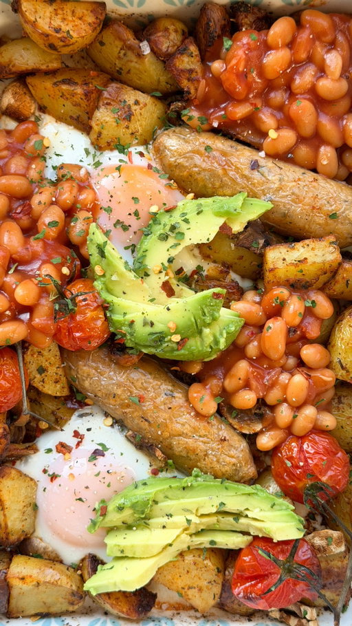 The ultimate full english tray bake !! 🤠🤠🥑🥑🥓🥓🍳🍳

Posting at 8:30am on a saturday for full weekend breakfast inspo… you’re welcome xxx

PS, this served one (me) lol it was so good omg. You could easily double / triple the portion though for the wholeeee fam !! 😋😋😋

To make…

🍳 Preheat the oven to 200 degrees.

🍳 Dice up baby potatoes & season with garlic, onion powder, paprika, mixed herbs, parsley & salt and pepper. Pop into the oven for 20 minutes.

🍳 Give them a shake and add your sausages, mushrooms & tomatoes adding more seasoning if desired.

🍳 Pop into the oven for 15-20 minutes.

🍳 Make space for your eggs and crack them into the gaps. Pop back into the oven for 7 minutes.

🍳 Layer on some baked beans & avocado to serve. Grab some thick crusty bread for dipping & enjoy !! 

#veggierecipes #quickandeasymeals #veggiebreakfast
