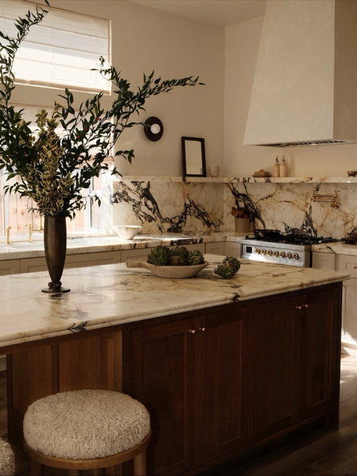 our kitchen got an infusion of warmth 🤎

swipe for the before! we kept the same cabinets + layout to save time and cut costs so we could splurge on our marble countertops and only replaced the kitchen island with these rift oak cabinets. 

i’m OBSESSED with the transformation. there are still a few corners of this kitchen that need work but we’re addressing those until the new year. i’m just so happy to have a functional kitchen for the holidays !! we never planned on remodeling our kitchen because we’ve been saving for our forever home but now i wish i had done this sooner. cooking in a kitchen you love is so much better 🤎
