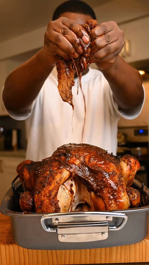 This is one of the juiciest turkeys I’ve ever made. The Chipotle Roasted Garlic Butter with herbs really took this bird to another level. 

Recipe,
Ingredients,
1 whole turkey
3/4lb unsalted butter 
1 small can chipotle peppers - blended
2 whole bulbs garlic
1 bunch rosemary 
1 bunch thyme 
1 bunch sage 
2 tablespoons all purpose seasoning 
2 tablespoons paprika 
2 tablespoons salt
1 tablespoon black pepper
2 white Onions
1 large Carrots
2 stalks Celery
2 Lemons 

Plus Cheesecloth 

Method,
Using scissors trim any excess fat and skin. Throughly rinse your turkey and remove the neck. Pat dry with paper towel and season the entire bird with salt. Place in your fridge overnight. Using the turkey neck and one onion, carrot and celery make 2 litres of turkey stock. You can also add thyme and rosemary to this for added flavour. The next day, Preheat your oven to 400f. Roast two heads of garlic for 25 minutes in tinfoil with olive oil salt and pepper or until soft. In a bowl add your softened butter, chopped herbs, blended chipotle peppers, and roasted garlic. Season with salt and pepper and mix throughly until evenly combined. Place your turkey in a roasting tray and cover with the chipotle butter making sure to get under the skin of the breasts. Season with salt pepper and paprika. Fill the cavity of the bird with onions, lemons and herbs, any remaining herbs place on top and around the turkey. Turn oven down to 350f and roast. After the first hour pull the turkey out and baste it. Soak the cheesecloth in turkey stock and cover the turkey. Place back in the oven and baste every 30 minutes until it reaches an internal temperature of 160f. Approximately 13 minutes per pound. 

#thanksgiving #turkey #holidayrecipes #easyrecipes