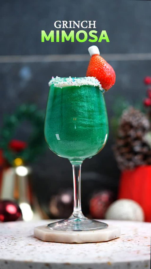 ✨ Comment “BOOK” and get an additional 20% OFF - on top of the already 50% OFF launch pricec for my exclusive 246-recipe Cocktail Book! 📚🍸🔥 

🎄💚 The Grinch Mimosa! 💚🎄
A great, delicious cocktail, perfect for your Christmas night! This time I added edible glitter and it looks gorgeous! ✨🥂

🧪 Recipe:
• 1 oz Blue Curaçao 💙
• 2 oz orange juice 🍊
• 1 bar spoon edible glitter ✨
• 3 oz champagne 🥂

🍬 Garnish:
Rim the glass with vanilla frosting and white sanding sugar. Then add a small upside-down marshmallow topped with a strawberry to create a cute little Christmas hat! 🎅🍓

#ChristmasCocktail #HolidayCheers #ChristmasSpirit #CocktailTime #Mixology #CheersToTheHolidays #FestiveDrinks #DrinkUp #HolidayRecipes #MerryMartini #ChristmasDelights #cocktail #bar #bartender #bartenderlife #cocktailsrecipe
