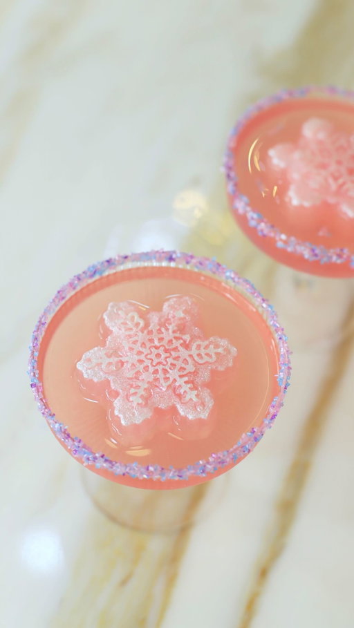 For Stella’s Winter ONEderland, we served the cutest Sugar Plum Fairy Punch using @drinkmilos Raspberry Lemonade 💗❄️🍭✨🎀🍬💕

We added edible glitter, rimmed the glasses with sparkly sugar, and even froze some into snowflake ice molds to keep the punch cold without watering it down!

Comment “sugar plum” for every utensil we used + Milo’s Raspberry Lemonade! #MilosMomentMakers #holidaydrinks #christmasdrink #holidayrecipes #christmaspartyideas