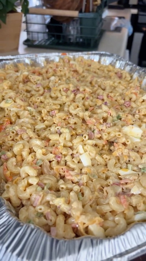 Puerto Rican Style Macaroni Salad 🇵🇷

* 2lbs Elbow Macaroni
* 6 Boil Eggs
* Adobo in Boiling Water
* 1/2 Green Bell Finely Diced
* 1/2 Red Onion Fineley Diced 
* Drizzle Oil on Macaroni with dash Sazon for color, or drizzle achiote oil, recipe pinned.
* 1 Large Grated Carrots
* Small Jar pimento pepper finely diced 
* 2 Packets 2.5oz Lite Spam or Diced Ham
* 8oz Grated Mild Cheddar

Dressing:
* 2c Mayonaise 
* 4Tbs White Vinegar
* 3Tbs Sugar
* Dash Mustard
* 2Tsp Adobo