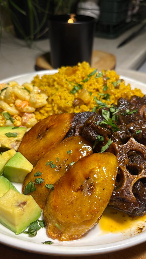 Spanish Infused Oxtail Recipe 

* 3lbs Oxtail
* 2Tbs Soy Sauce
* 2Tbs Achiote Oil Recipe Pinned (Substitute 2Tbs Oil with packet Sazon)
* 4-6 Garlic Cloves Minced
* Half Red Onion Diced
* Handful Minced Cilantro 
* 3 Aji Dulce (Substitute Cubanelle)
* 1Tbs Dominican Oregano (Substitute regular powder)
* 2 Cubes Chicken Bouillon 
* 1Tbs Garlic Powder
* 2Tsp Onion Powder
* 1Tsp Black Pepper
* 1Tsp Himalayan Salt or Sea Salt
* 3Tbs Achiote Oil or Regular to burn sugar 
* 2Tbs Sugar
* 2Tbs Tomato Paste
* 1/4c Merlot Wine (Optional deepen Flavors) 
* 6c Water 

Direction Step by Step

1. Add the spices and herbs to marinate your oxtails, give a nice mix, and let it sit 30minutes to 1hr.
2. Add any oil of your choice on high heat, along with the sugar, till sugar is burn. 
3. Add oxtail, and caramelize both sides.
4. Add wine, let it cook for a minute, to kill the alcohol, add tomato paste to the water, then add water to your oxtail on high heat.
5. Once you bring your water to boil, bring your temperature to soft boil, on low heat,  for the first 1hr uncover, and mix. You want to do this every 30 minutes, then cover until meat is tender, between 2 1/2-3hrs cook time. If you need water, keep adjusting every 1/2c of water, if needed! 
6. Then serve with any of your favorite side dish 💟