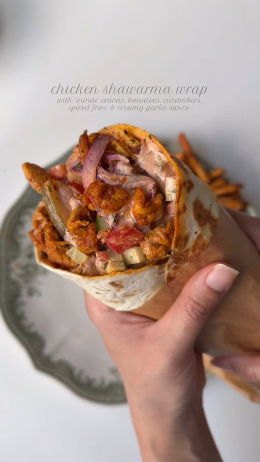 Chicken shawarma wrap 🌯 

Ingredients 

For the chicken:

2 lb boneless chicken breast/ thighs, cut into thin slices 
1 tbsp fresh garlic, finely minced 
2 tbsp mayonnaise 
1 tbsp olive oil
1 tbsp smoked paprika powder 
1 tsp garlic powder 
1 tsp black pepper powder 
1/2 tsp cumin powder 
1/2 tsp coriander powder 
1 tsp red chili powder 
1/2 tsp turmeric powder 
Salt to taste
1 tbsp fresh lemon juice 
3 tbsp clarified butter/oil for cooking 

For the sumac onions

1 large red onion, thinly sliced and washed 
1 tbsp fresh parsley, chopped 
1 tbsp sumac 
1 tsp lemon juice 
Salt to taste

For the garlic sauce :

1/3 cup mayonnaise 
1/3 cup sour cream
3-4 tbsp butter milk ( less or more to adjust the consistency of the sauce )
2 tbsp ketchup 
2 tbsp hot sauce 
1 tsp freshly chopped parsley 
1 tsp lemon juice 
1 tbsp garlic powder 
1 tbsp smoked paprika powder 
Salt to taste
1/2 tsp black pepper 

To assemble:

6 tortilla wraps
1/2 cup cucumber, chopped 
1/2 cup tomatoes, chopped 
Spiced French fries
1/2 cup pickled cucumbers 

Method:

In a mixing bowl add chicken, season with salt, pepper, garlic powder, smoked paprika powder, turmeric, red chili powder. Add in the mayonnaise, garlic, oil and lemon juice. Mix until well combined. Cover and let it marinate for at-least 1 hour.

Prepare the sauce by mixing mayonnaise, sour cream, buttermilk, salt pepper, paprika powder, garlic powder, hot sauce, lemon juice, ketchup in a bowl. Whisk until smooth and creamy. 

Make the sumac onions by mixing onions, parsley , sumac, salt lemon juice in bowl.

In a pan, heat clarified butter over medium heat. Once melted, add the chicken and cook in batches, ensuring not to overcrowd the pan. Cook for about 8-10 minutes, tossing occasionally, until the chicken is fully cooked through.

Assemble the wrap by warming the tortilla, then adding sauce, Sumac onions, chicken, tomatoes, cucumber, pickled cucumbers, French fries, and more sauce. Close it and serve one.

#wrap #chickenwrap #recipe