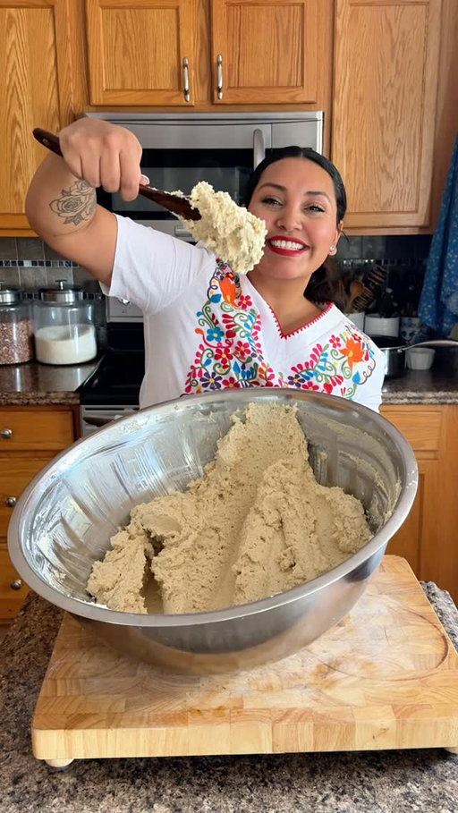 Tamales Masa 🫔

MY WAY if your grandma made it different or your mom or your dog, that’s fine. Stop arguing with the keyboard. 

This recipe made me 22-23 tamales plus some to freeze. 

What you’ll need: 
- chicken broth (I used 1.5 gallons) 
- lard (I used 24oz, a whole tub) 
- masa ( I used 4 pounds, a whole bag of Maseca)
- baking powder (I used 4 tbs) 
- salt is optional (your broth should have plenty)

Your masa should feel like soft whipped butter or hummus, not doughy.

✅ Ready masa:
Spreads easily on a corn husk with a spoon or spatula
Holds its shape but doesn’t stick heavily to your fingers
Feels light, airy, and fluffy, not dense

❌ Not ready:
Cracks when spreading → too dry
Sticky or elastic → not enough fat or liquid
Heavy and pasty → under-whipped or too much masa harina

>>>The Spread Test (better than floating)<<<

This is what many cooks use instead of floating.
	1.	Spread a thin layer on a husk
	2.	Tilt the husk slightly

✅ Ready:
Masa stays put and looks smooth
No cracking or sliding off

❌ Not ready:
Slides off → too wet
Breaks → too dry

If it fails tests:

	•	Too dense → add warm broth (1–2 tbsp at a time)
	•	Too dry → add broth
	•	Gummy → whip longer
	•	Heavy → add fat & whip

Okay next video? How to make chile verde tamales! 
Per usual my fav lip color is from @nyxcosmetics 
#mexicanfood #tamales