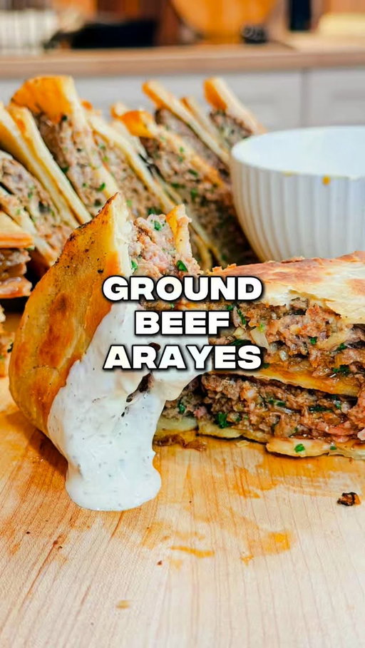 GROUND BEEF ARAYES RECIPE ⬇️

🙋‍♂️ First time making arayes, and I will definitely be making them again. They’re loaded with so much flavor and when the whole family loves dinner that’s an added bonus.

I’m using my homemade mayo and tortillas for this…if you want those recipes so you don’t have to go searching for them, comment “MAYO” and I’ll send them right to you.

Although this isn’t how they’re “traditionally” made, I made them in a way that worked for me…and since it’s my kitchen…I’m allowed to do that 😉

Give them a try…share this recipe…and let me know what you think!

INGREDIENTS:
2 lbs @goodranchers ground beef
6 tortillas (or pitas)
2 tsp paprika
2 tsp cumin
2 tsp coriander
1 tsp black pepper
1 tbsp sea salt
6 cloves garlic
1/2 large sweet onion
1/4 cilantro
1/4 cup parsley

CREAMY GARLIC SAUCE:
1/2 cup sour cream
1/2 cup homemade mayo
6 cloves garlic
1 tsp black pepper
1 tsp sea salt
1 tsp cumin
2 tsp vinegar
1 tbsp lemon juice
1 heaping tbsp parsley
1 heaping tbsp cilantro

DIRECTIONS:
1.) Combine all spices and seasonings into a large bowl with your ground beef. Gently mix until combined. Set aside.

2.) Combine all sauce ingredients and mix together. Place into fridge.

3.) Fill tortillas or pitas with 1/6th of your meat mixture. Add olive oil to a pan over medium heat. Lay your arayes in the pan and cook until golden brown. Flip and repeat. Grab with tongs and brown the exposed meat edge as well. Set aside and repeat with remaking arayes.

4.) Serve immediately with garlic cream sauce. Save, share this video, and most of all enjoy!

#groundbeef #groundbeefrecipes #arayes #dinnerideas
