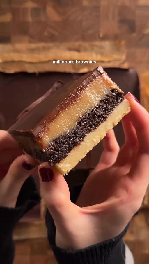 millionaire brownies
shortbread crust:
1 cup (226g) unsalted butter, soft
1/2 cup (100g) sugar
1/2 tsp (2g) salt
2 cups (240g) flour
*cream together the butter and sugar. then mix in the flour and salt until combined. press into a LINED 9x9 pan and make dots with a fork. bake at 350 for 18-20 min.

brownie:
2 eggs
1/2 cup (42g) cocoa powder
1/2 tsp (3g) salt
1/2 tsp (2g) baking powder
1 1/2 tsp (6g) vanilla
1/2 cup (113g) melted butter
1 cup (200g) sugar
3/4 cup (95g) flour
*in a separate bowl cream butter and sugar, then microwave gradually until sugar dissolves and is shiny. set aside. in another bowl, mix together eggs, cocoa, salt, baking powder, and vanilla. combine the egg and butter mixtures well, then mix flour. spread over the baked shortbread and then bake at 350 for 20-24 min or when the middle is just barely set. let cool to room temp.

salted caramel:
1/2 cup (113g) unsalted butter
1/2 cup (100g) brown sugar
1 can (14oz / 397g) sweetened condensed milk
1/4 cup (60g) heavy cream
1 tsp (4g) vanilla
1/2 tsp salt + flakey salt on top after
*cook butter and sugar in a saucepan, on around med, until dissolved. then add in the condensed milk and heavy cream. continue cooking for 5 min and it becomes thicker and a bit darker. stir in the vanill aand salt then pour over the cooled brownies. set in the fridge for 30 min. 

chocolate top:
7oz semi sweet chocolate
*can with just melt and pour or top then set in fridge until fully set