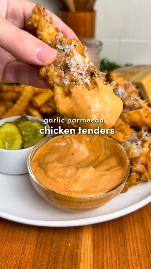 Garlic Parmesan Butter Chicken Tenders 🧄🧈

Comment “Recipe” and I’ll send you the full recipe card for free!!

Crispy, garlicky, buttery perfection… and way easier than you might think. Warning though, these are truly addictive 🐔
 
Ingredients:

-2 lbs (0.9 kg) chicken breast, sliced into strips (or use tenderloins)
-@primalkitchenfoods avocado oil for frying
Marinade:
-2 cups buttermilk
-1/3 cup pickle juice
-1 tsp garlic powder, 1 tsp paprika, 1 tsp onion powder, 1 tsp salt, 1 tsp black pepper
Flour Mixture:
-2 cups all-purpose flour
-1/2 cup cornstarch
-2 tsp garlic powder, 1 tsp paprika, 1 tsp salt, 1 tsp pepper
Dipping Sauce:
-1/4 cup mayo
-2 tbsp ketchup
-2 tsp Worcestershire sauce
-1/2 tsp paprika, 1 tsp garlic powder, 1 tsp onion powder, 1 tsp pepper, 1/2 tsp salt
Garlic Parmesan Butter:
-1/4 cup butter
-5 garlic cloves, minced
-1 tbsp fresh parsley, chopped
-1/3 cup grated Parmesan

Instructions:
1. Slice your chicken into tenders. In a bowl, mix buttermilk, spices, and pickle juice. Add the chicken and marinate for at least 2 hours, or overnight if you want elite-level tenders.
2. Combine all flour mixture ingredients in a large bowl. Whisk it up like you mean it.
3. Add avocado oil to a large pot or deep skillet. Heat to 350°F / 175°C. (Shallow or deep fry—your kitchen, your rules.)
4. Drizzle a little buttermilk from the marinade into the flour mixture and stir to form flaky crispy bits.
Coat each chicken piece in the flour mixture. Shake off excess. Gently place into the hot oil.
5. Don’t touch them for the first 1–2 minutes—that’s how you get the perfect crust. Fry for 8–10 minutes, or until golden and cooked through (165°F / 75°C). Transfer to a paper towel-lined rack.
6. Make the dipping sauce: Mix everything together in a small bowl. Boom. Done.
7. In a small pan/pot, melt butter on medium-low, add garlic + parsley, and cook for about 3 minutes until fragrant. Remove from heat.
8. Add the  tenders to a bowl, pour over your garlic butter, add parmesan, and toss until everything glistens like it’s ready for a close-up. Serve with fries and enjoy!