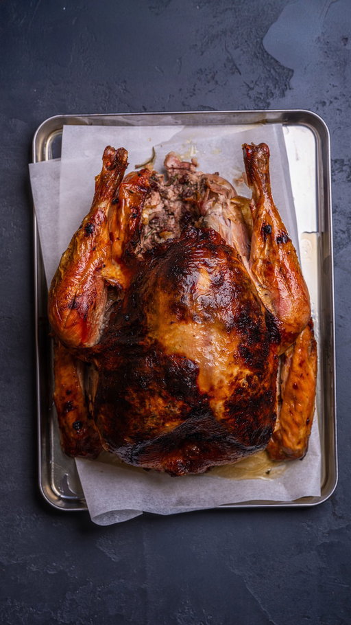 For a lot of people turkey only happens once a year… which is why it stresses everyone out.

This time I tried something a bit different: compound butter under the skin.
Does it actually keep the breast juicy? You’ll see.

I used @meatermade probes so I could track the breast and thigh separately and let the oven do its thing.

THE RECIPE

Brine
3L water
72g salt
5g bicarb
1 lemon
10 garlic cloves
Bay, rosemary, thyme

Simmer 1 min → cool fully → turkey in overnight. Pat dry. Keep herbs & lemon for stuffing.

Compound Butter
375g butter
2 tbsp olive oil
150g dried cranberries
Zest of 1 orange
3 garlic cloves
Salt & pepper

Mix. Loosen skin with a spatula and push the butter underneath.

Roast
2 onions
Olive oil
Giblets

Stuff turkey with onions + saved aromatics. Oil the skin.
Cook 10 min at 220°C.
Add bacon over the breast → drop to 180°C and roast until breast + thigh hit your target temps.
Rest 1 hour.

Gravy
Flour
150ml dry white wine
250ml stock
2 tsp red wine vinegar

Skim fat, add aromatics + bacon, cook flour until golden.
Deglaze with wine → reduce → add stock → reduce again.
Strain. Season.

#MEATER #MEATERMADE
#HowToTurkey #RoastItRight #CookToTemperature
AD