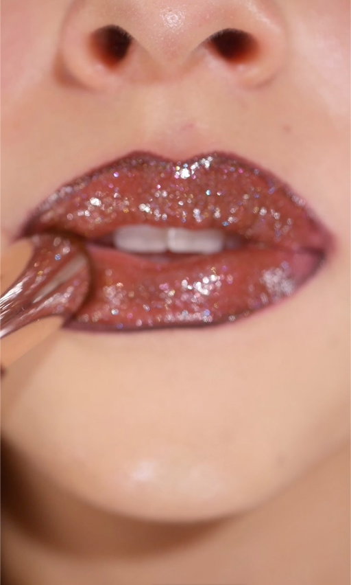 Hot Chocolit with a side of shimmer ☕️✨

‘Tis the season of yummy, sparkly hot cocoa lips 🍫 @miabgalvan is dipping into this gorgeous chocolate Fenty lip combo that’s perfect for your festive night outs ⤵️

🤎 Trace’d Out Lip Liner in ‘Bored Heaux’
🤎 Gloss Bomb Shimmer Stix in ‘Hot Chocolit’

Shop this delicious combo at @sephora, @sephoracanada, @kohls #sephoraxkohls, @ultabeauty, fentybeauty.com and globally!