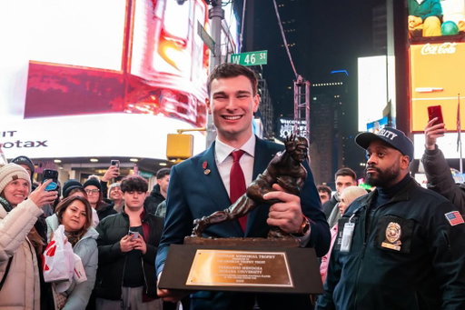 @fernandomendoza brought his new hardware to Times Square. 

He brought some friends along too 🙌

#Heisman