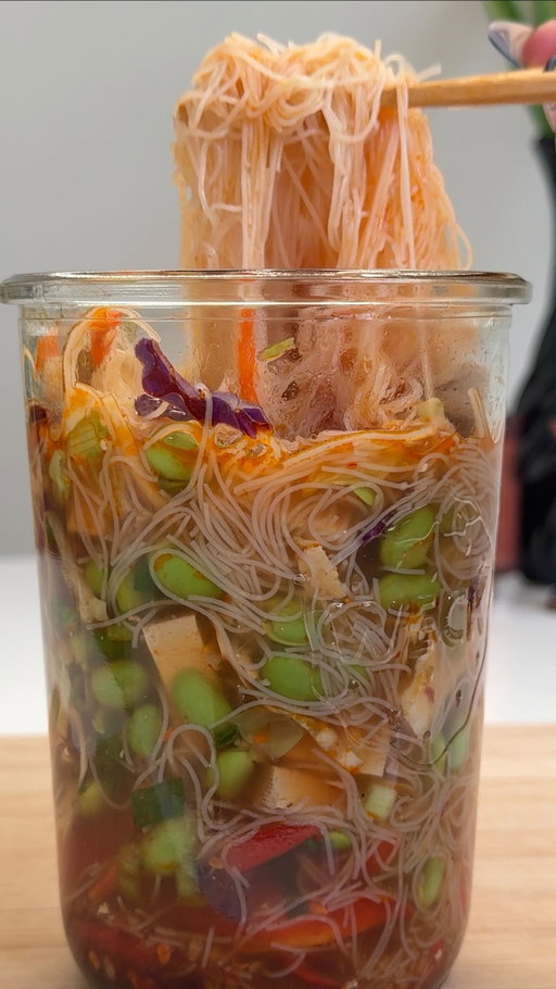 Instant noodle jars >>>>

These measurements are just estimates I just eyeball everything 
Ingredient
2 tbsp vegetable bouillon 
1 tsp chili crunch oil
1 tbsp soy sauce
1 tsp sesame oil 
2 tsp minced garlic 
Sliced red bell pepper
Shredded cabbage mix
edamame
tofu (you can sub with chicken)
Sliced green onions
Instant vermicelli rice noodles

Instructions:
1. To the bottom of the jar add vegetable bouillon, chili oil, soy sauce, sesame oil and garlic. Mix together.
2. Ad red bell pepper, cabbage, edamame, green onion, tofu, noodles. Add boiling water and let noodles sit for 5 min or until cooked.

#healthyrecipes #easyrecipes #mealprep