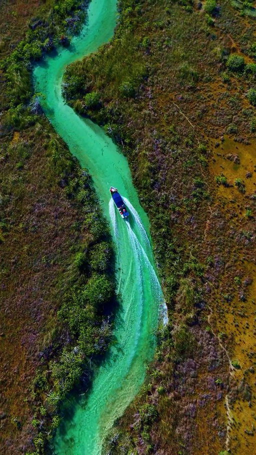A few days ago we went out on the water inside the Sian Ka’an Biosphere Reserve, and it surprised me.

We took a boat deep into the reserve, flying just above the water. The river is incredibly shallow and crystal clear, but the current is powerful. At one point they cut the engine, handed us life vests, and dropped us into the water.

And then you just float.

For close to two miles, you let the current carry you through this untouched stretch of nature. No noise. No development. No distractions. Just water, sky, mangroves, and time slowing down.

We also flew the drone above the boat, and that’s when the scale really hits you.

The Sian Ka’an Biosphere Reserve spans roughly 2,040 square miles. That’s larger than some countries. Mangroves, wetlands, jungle, reef systems, and waterways all protected as a UNESCO World Heritage Site. And this isn’t somewhere far away on a map. This is South Tulum.

And @olastulum is the last hotel before you enter it. That matters. And I wouldn't have known this without @hiptraveler, so thank YOU! 

From a destination psychology perspective, this is what most places get wrong. They build up to the edge of something extraordinary, then erase the very thing that made it special. Overbuild. Overprice. Overpromise. Until the magic disappears.

Olas took the opposite approach.

You feel it in the restraint.
You hear it in the waves at night.
You see it from the air.

Being this close to a protected ecosystem of this size forces a different mindset. You move slower. You observe more. You become aware of how small decisions add up.

This is why zero waste travel isn’t about rules. It’s about awareness. When you’re floating through a living system like this, you understand very quickly that you’re not the center of the experience. You’re a guest.

For those who’ve been to Tulum, what does Tulum mean to you today, versus a few years ago?

And for those who haven’t been, what do you think it represents?