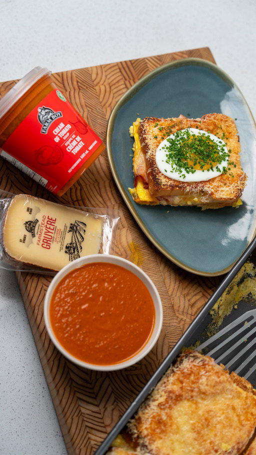 #AD A holiday Croque Monsieur or Croque Madame bake — or “Madame” once you add the fried egg.
 
Made with Farm Boy private label products you’ll love like Black Forest ham, Swiss cheese, Dijon, freshly baked bread, under a blanket of Gruyère cheese. 
 
Pair it with their Cream of Tomato Soup and brunch is handled.  Add some fresh thinking to your holidays. Thousands of hand-picked Farm Boy products just for you!
 
INGREDIENTS
 
1 Farmhouse Loaf
Farm Boy™ Dijon Mustard
Farm Boy™ Black Forest Ham, sliced
Farm Boy™ Swiss Cheese Slices (2 slices per sandwich)
6 eggs
1 cup of Farm Boy™ Organic 3.8% Whole Milk
Splash of heavy cream
Salt + black pepper
Farm Boy™ Farmstead Gruyere Cheese, grated (enough to fully cover the top)
Fried eggs (optional — to “Madame” it)
Farm Boy™  Cream of Tomato Soup, for serving
Chives, finely sliced (optional garnish)
 
METHOD
 
Spread Dijon on both sides of each slice of bread.
 
Build sandwiches using Black Forest ham and 2 slices of Swiss in each.
 
Pack the sandwiches snugly into a baking dish.
 
In a bowl, whisk together the eggs, milk, heavy cream, salt, and black pepper.
 
Pour the mixture evenly over the sandwiches, ensuring the bread is fully soaked.
 
Cover and refrigerate overnight.
 
The next day, uncover and top generously with grated Gruyère.
 
Bake at 350°F for 20–25 minutes, until set.
 
Switch to broil for the last 2 minutes to toast the top.
 
Let cool for 1–2 minutes, then slice and serve.
 
Top with a fried egg and chives if desired.
 
Serve alongside warmed Farm Boy Cream of Tomato Soup.
 
#FarmBoy #HolidayCooking #HolidayBrunch #MadeEasy #AFarmBoyFreshTwist
